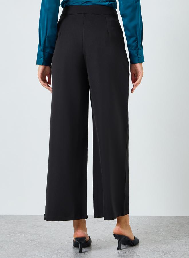 ستايلي بنطال رسمي بأرجل واسعة وتفاصيل كسرات أمامية - Image 4